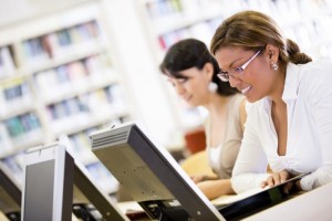 Women doing library research, similar to metadata research