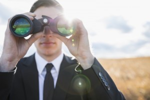 man with binoculars