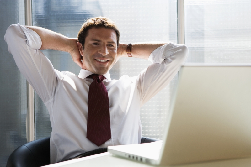 satisfied man at computer