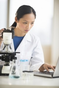 doctor with laptop in lab