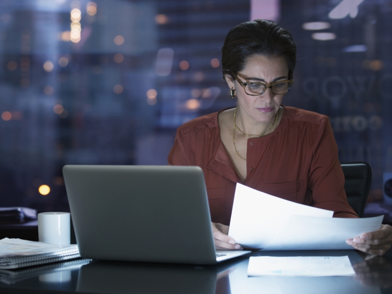 woman working late in office