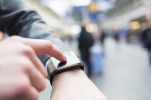 person checking a smart watch 