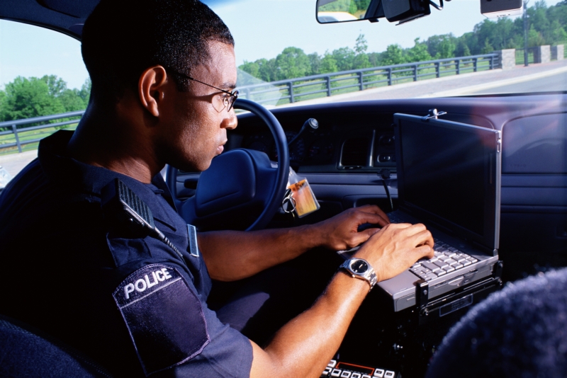 policeman records evidence similar to preparing a business glossary