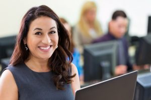 Young woman learning new big data skills