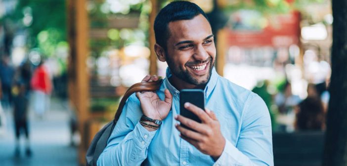 Man on smartphone considers data privacy concerns