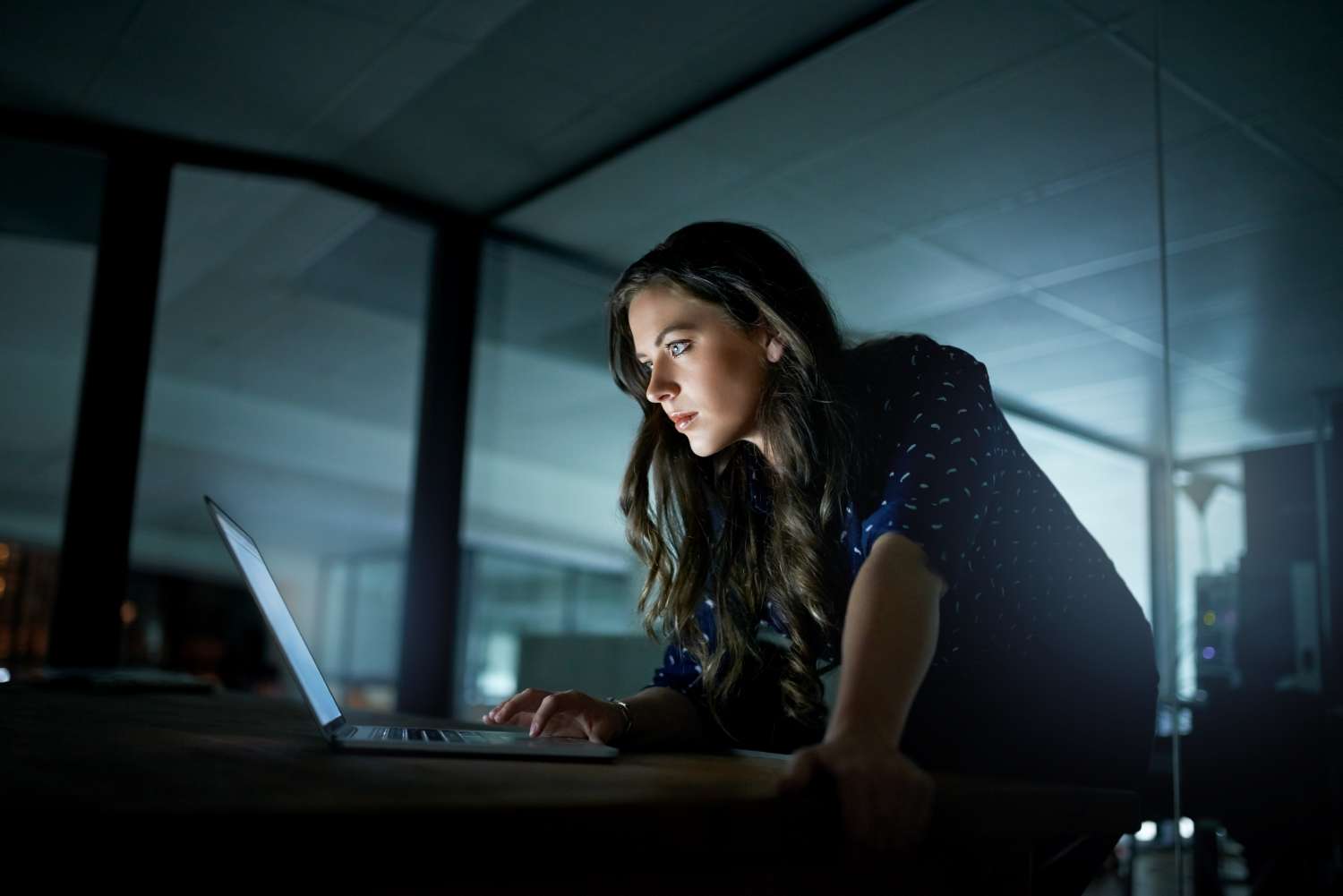 Woman working late to implement record-level security