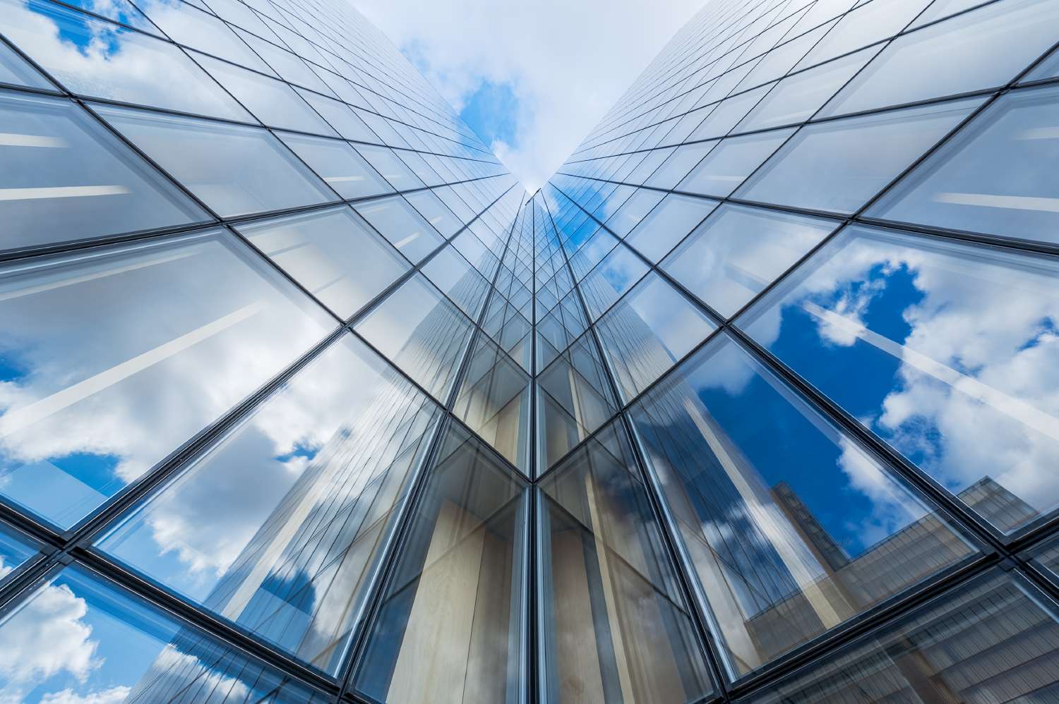 View of sky and tall building reflects on what will happen next