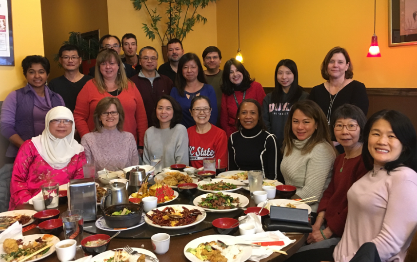 SASIC members enjoy a Chinese food lunch.