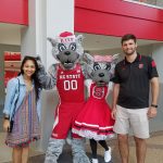 Selena cheering on the Wolfpack