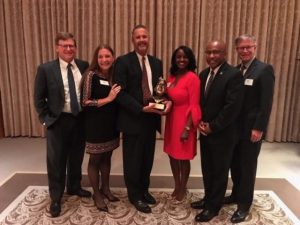 Tim accepts the Thurgood Marshall College Fund Presidential Leadership Award