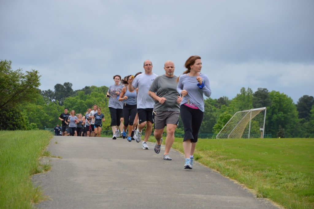 SAS employees running on the outdoor track