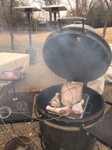 sensors attached to turkey inside a smoker 