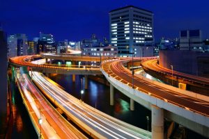 Modern freeway lit up at night