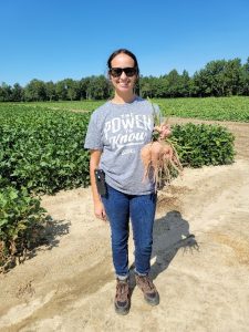 Shelly Hunt holding sweet potatoes