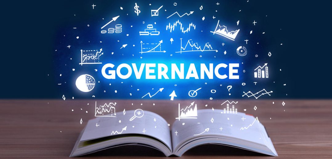 GOVERNANCE inscription coming out from an open book, business concept