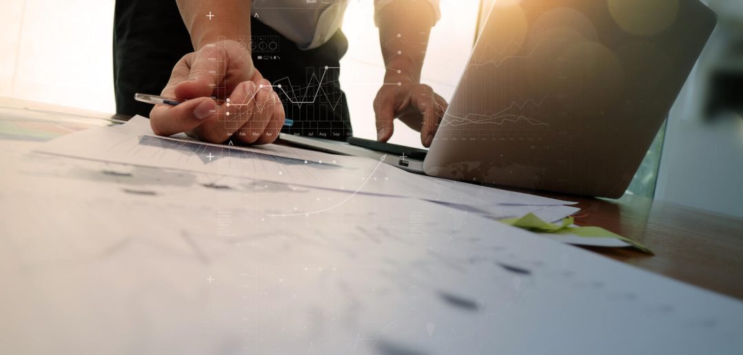 close up of business man hand working on laptop computer with business graph information diagram on wooden desk as concept; Shutterstock ID 336631610; PO: redownload; Job: redownload; Client: redownload; Other: redownload