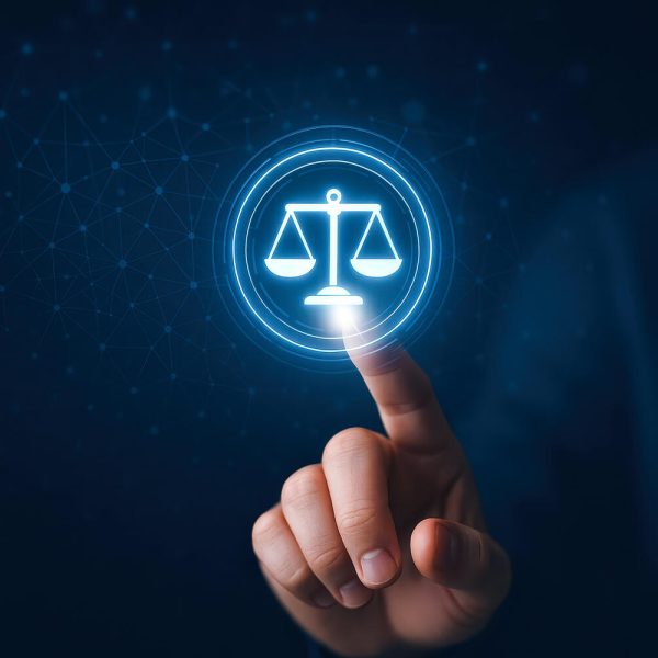 A concept of law and justice merges with technology as finger touches glowing cyber law scale symbol representing lawyer services and ai in law innovation