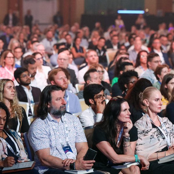 Crowd watching a general session at SAS Innovate 2025