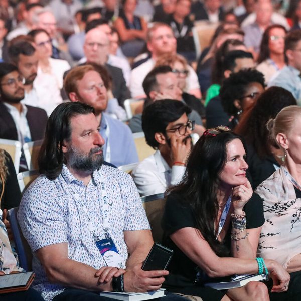 Crowd watching a general session at SAS Innovate 2025