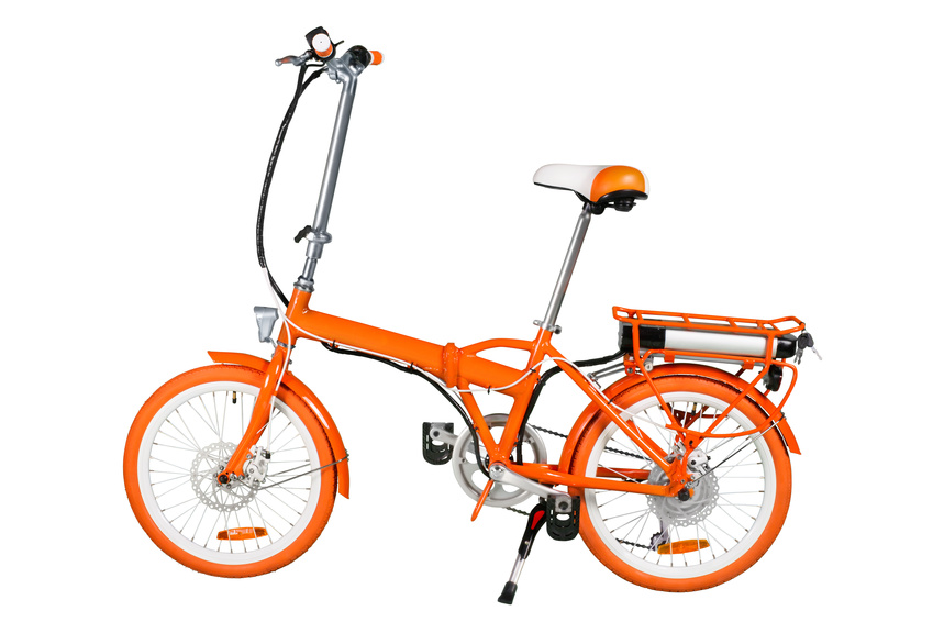 Orange electric bike isolated on a white background with a full clipping path