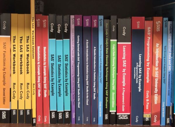 Ron Cody's books on a bookshelf.